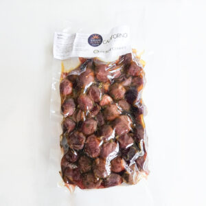 Mørkebrun oliven med en blød tekstur på ganen og let bitre undertoner.